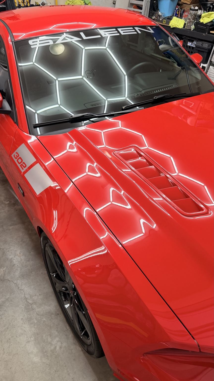 Red performance car with glossy finish